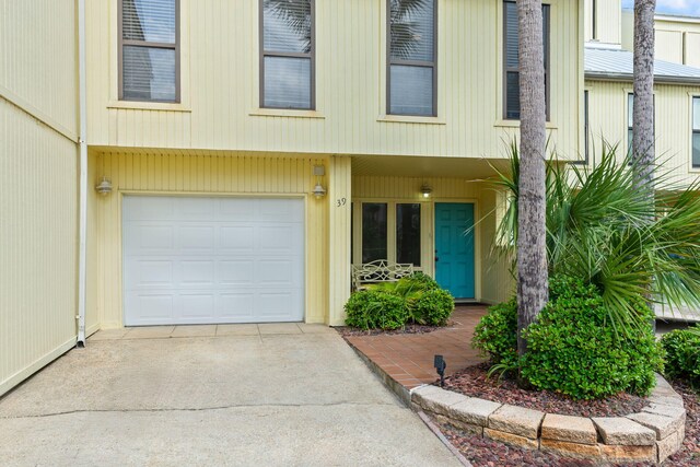 8520 Gulf Blvd # Ut-39, Navarre, FL 32566 - view of front facade featuring an attached garage and driveway