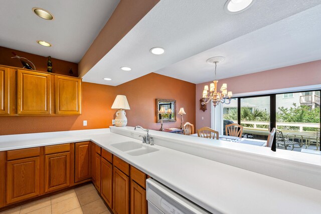 8520 Gulf Blvd # Ut-39, Navarre, FL 32566 - kitchen with a sink, a chandelier, light countertops, brown cabinetry, and recessed lighting