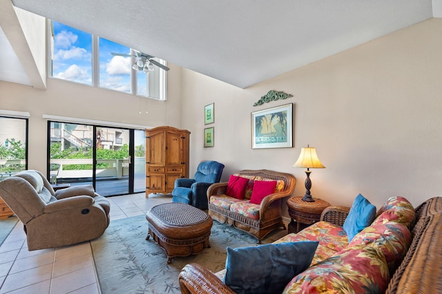 8520 Gulf Blvd # Ut-39, Navarre, FL 32566 - living area with light tile patterned floors, high vaulted ceiling, and ceiling fan