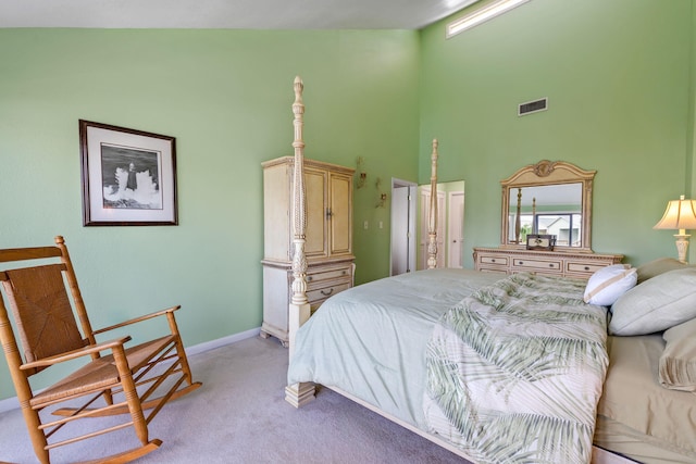 8520 Gulf Blvd # Ut-39, Navarre, FL 32566 - bedroom featuring a high ceiling, light carpet, and baseboards