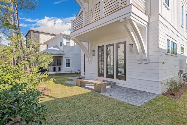 107 Grande Pointe Dr, Inlet Beach, FL 32461 - entrance to property with a lawn and board and batten siding