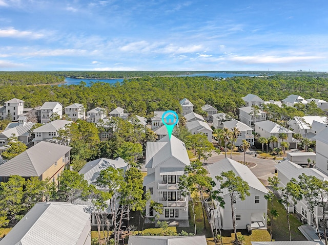 107 Grande Pointe Dr, Inlet Beach, FL 32461 - aerial view of residential area featuring a nearby body of water and a forest