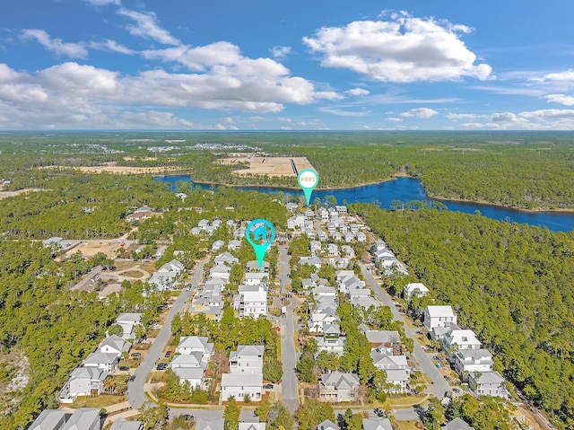 107 Grande Pointe Dr, Inlet Beach, FL 32461 - aerial perspective of suburban area featuring a large body of water and a heavily wooded area