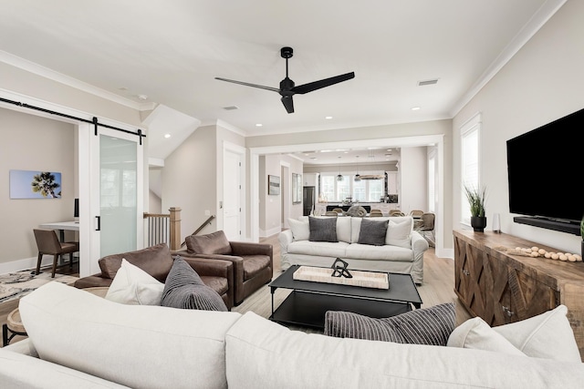 107 Grande Pointe Dr, Inlet Beach, FL 32461 - living area featuring a ceiling fan, crown molding, a barn door, baseboards, and recessed lighting