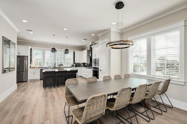 107 Grande Pointe Dr, Inlet Beach, FL 32461 - dining area with crown molding, baseboards, light wood-type flooring, and recessed lighting