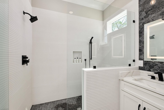 107 Grande Pointe Dr, Inlet Beach, FL 32461 - bathroom with a walk in shower, tile walls, and vanity