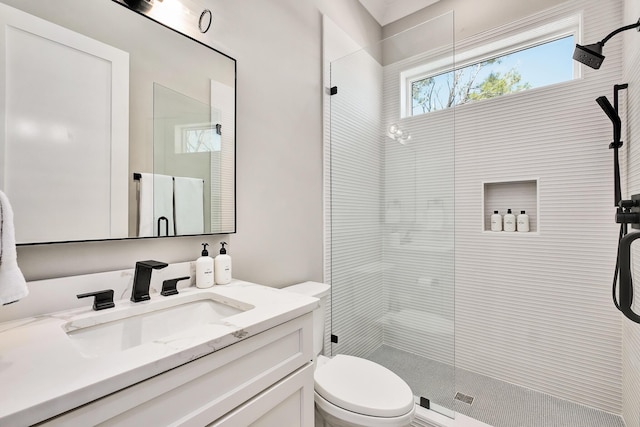 107 Grande Pointe Dr, Inlet Beach, FL 32461 - bathroom with a tile shower, toilet, and vanity