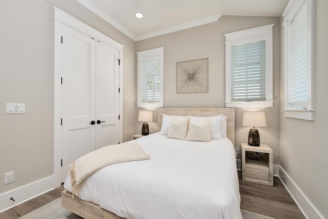 107 Grande Pointe Dr, Inlet Beach, FL 32461 - bedroom featuring wood finished floors, baseboards, recessed lighting, a closet, and lofted ceiling