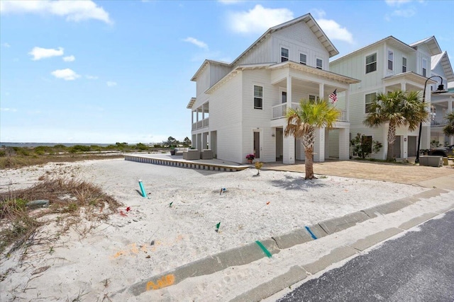 1454 Seaside Cir, Navarre, FL 32566 - view of front facade with a balcony
