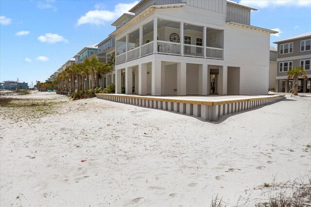 1454 Seaside Cir, Navarre, FL 32566 - back of property featuring a balcony