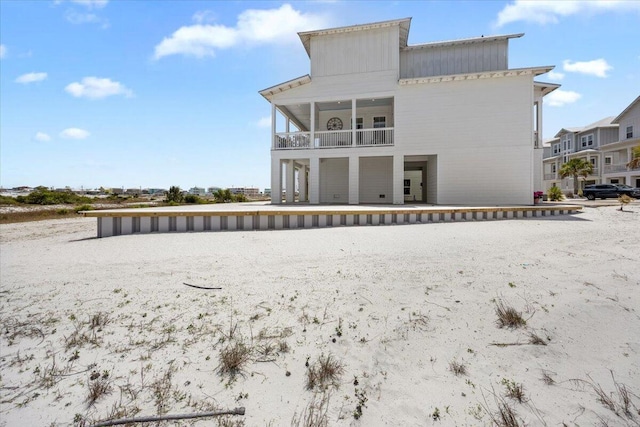 1454 Seaside Cir, Navarre, FL 32566 - rear view of house with a balcony