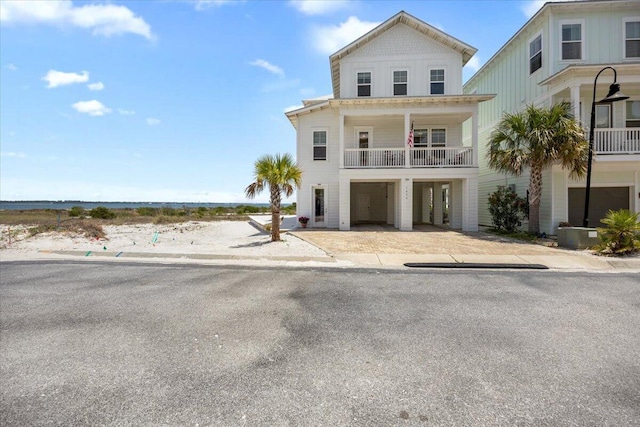 1454 Seaside Cir, Navarre, FL 32566 - raised beach house featuring a balcony