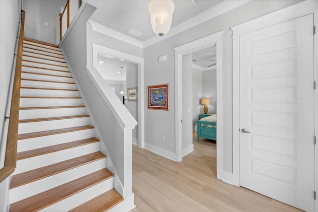 1454 Seaside Cir, Navarre, FL 32566 - stairway featuring baseboards and wood finished floors