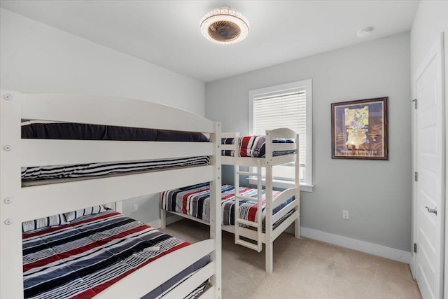 1454 Seaside Cir, Navarre, FL 32566 - bedroom featuring baseboards and light carpet