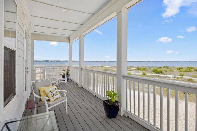 1454 Seaside Cir, Navarre, FL 32566 - wooden deck with a water view