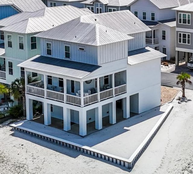 1454 Seaside Cir, Navarre, FL 32566 - rear view of property featuring a balcony and a residential view