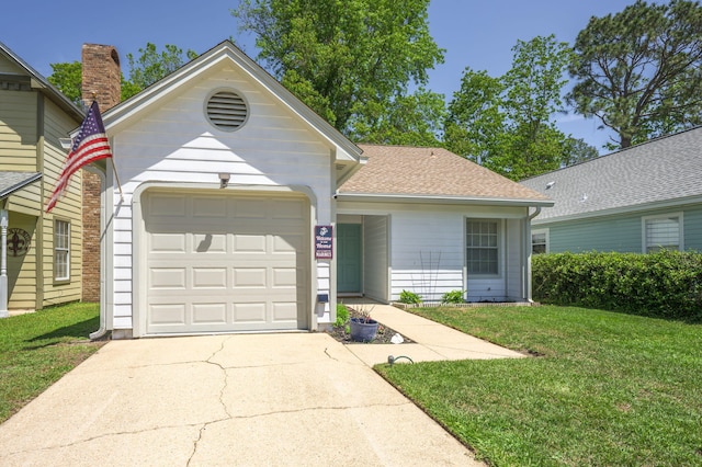 2527 Georgetown Ln, Fort Walton Beach, FL 32547 - ranch-style home with a front lawn, driveway, roof with shingles, and a garage