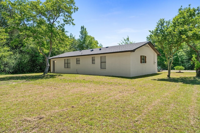 3335 Rolling Hills Cir, Bonifay, FL 32425 - rear view of house featuring a yard and concrete block siding