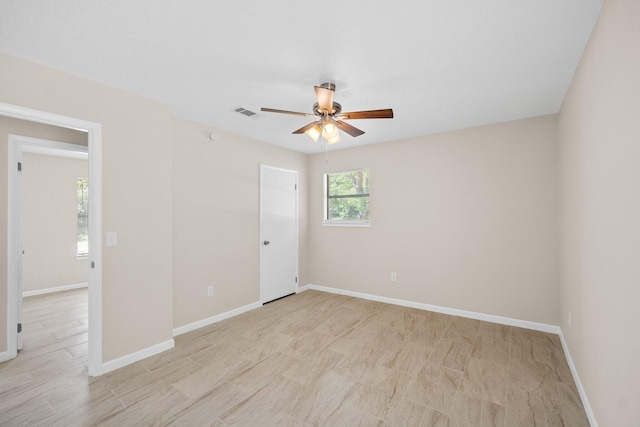 3335 Rolling Hills Cir, Bonifay, FL 32425 - empty room featuring baseboards, a ceiling fan, and visible vents