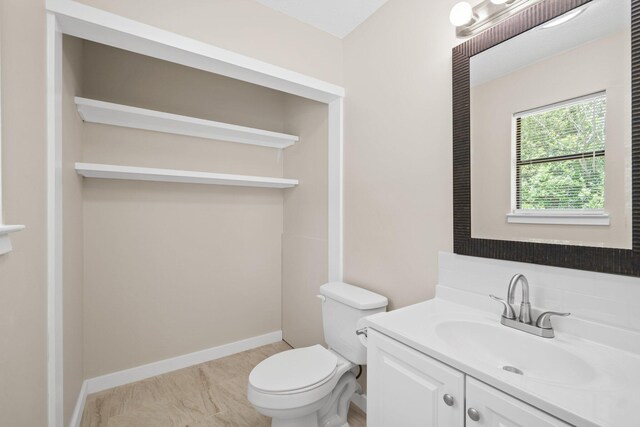 3335 Rolling Hills Cir, Bonifay, FL 32425 - bathroom featuring toilet and vanity