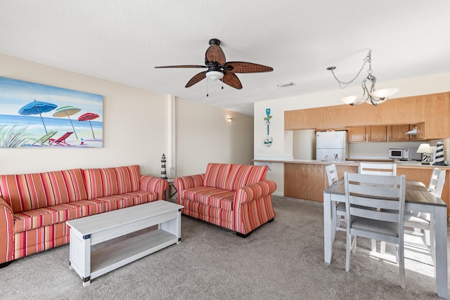 468 Abalone Ct Unit 31, Fort Walton Beach, FL 32548 - living room featuring light colored carpet, a ceiling fan, and visible vents