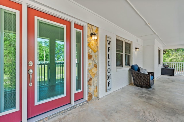 1259 Black Creek Blvd, Freeport, FL 32439 - view of exterior entry featuring a porch