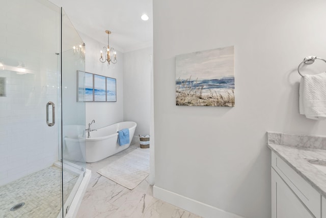 205 Mallard Ln, Santa Rosa Beach, FL 32459 - full bathroom featuring a soaking tub, an inviting chandelier, marble finish floor, a shower stall, and vanity