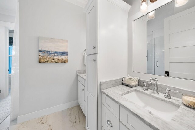 205 Mallard Ln, Santa Rosa Beach, FL 32459 - bathroom featuring baseboards, marble finish floor, vanity, and a stall shower