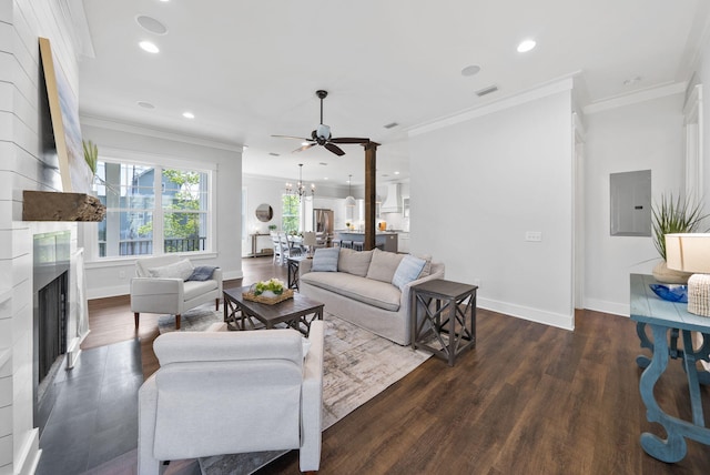 205 Mallard Ln, Santa Rosa Beach, FL 32459 - living area with electric panel, dark wood finished floors, baseboards, ceiling fan with notable chandelier, and a fireplace