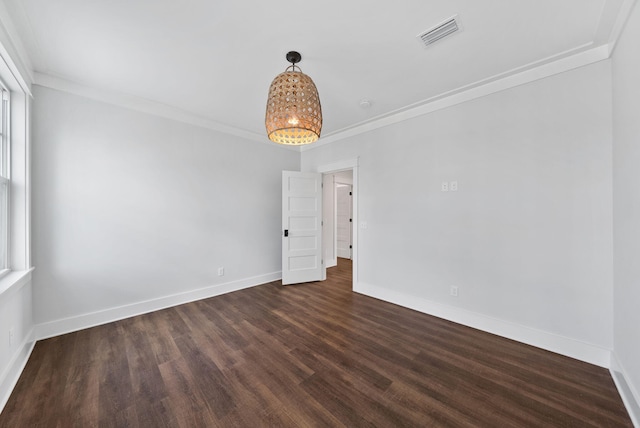 205 Mallard Ln, Santa Rosa Beach, FL 32459 - spare room with dark wood finished floors, baseboards, crown molding, and visible vents