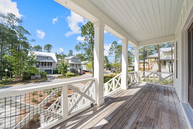 205 Mallard Ln, Santa Rosa Beach, FL 32459 - wooden terrace with a residential view and a porch