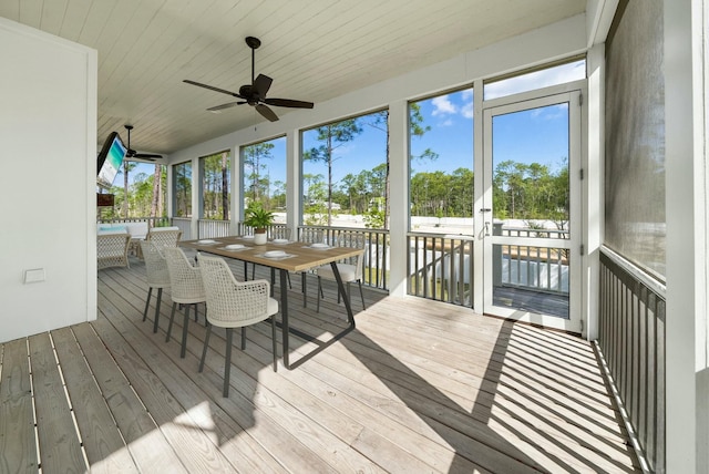 205 Mallard Ln, Santa Rosa Beach, FL 32459 - sunroom featuring ceiling fan and outdoor dining area