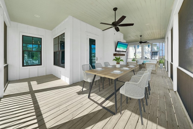 205 Mallard Ln, Santa Rosa Beach, FL 32459 - sunroom with outdoor dining area and ceiling fan
