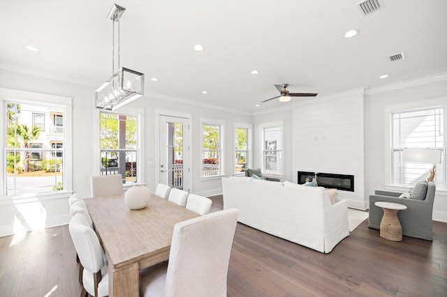 dining space featuring visible vents, crown molding, and recessed lighting