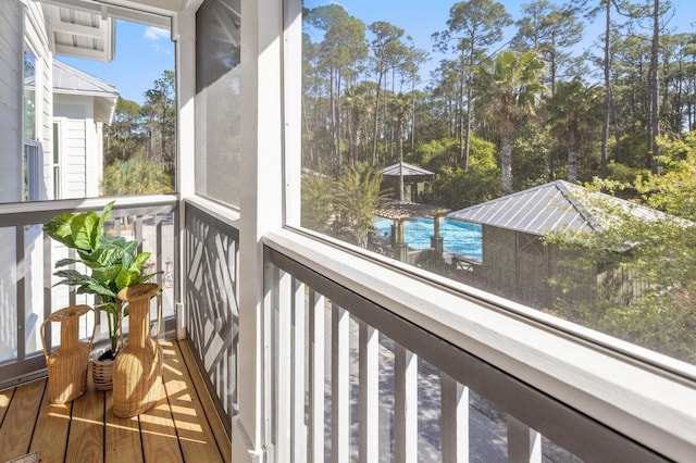 unfurnished sunroom with a wealth of natural light