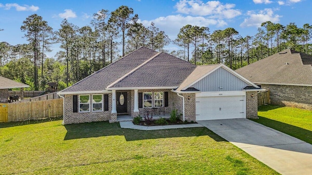 3291 Secret Isle Way, Navarre, FL 32566 - view of front of house with a garage, brick siding, and concrete driveway