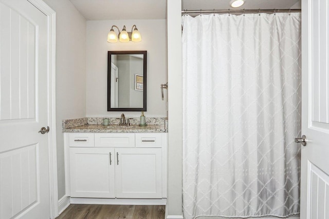 3291 Secret Isle Way, Navarre, FL 32566 - full bathroom with wood finished floors, vanity, and curtained shower