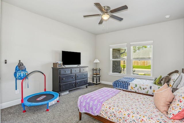 3291 Secret Isle Way, Navarre, FL 32566 - carpeted bedroom with baseboards and a ceiling fan