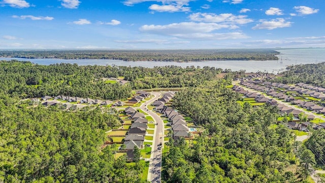 3291 Secret Isle Way, Navarre, FL 32566 - aerial view of residential area featuring a nearby body of water and a heavily wooded area