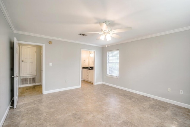 unfurnished bedroom featuring visible vents and crown molding