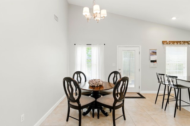 dining room featuring baseboards, visible vents, a chandelier, and light tile patterned floors