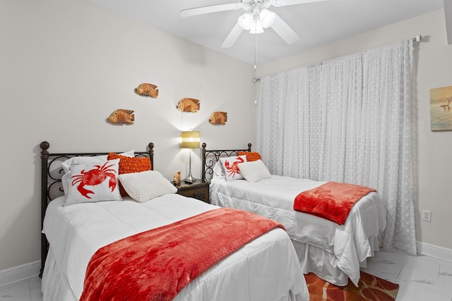 122 Seascape Dr Unit 701, Miramar Beach, FL 32550 - bedroom with marble finish floor, baseboards, and a ceiling fan