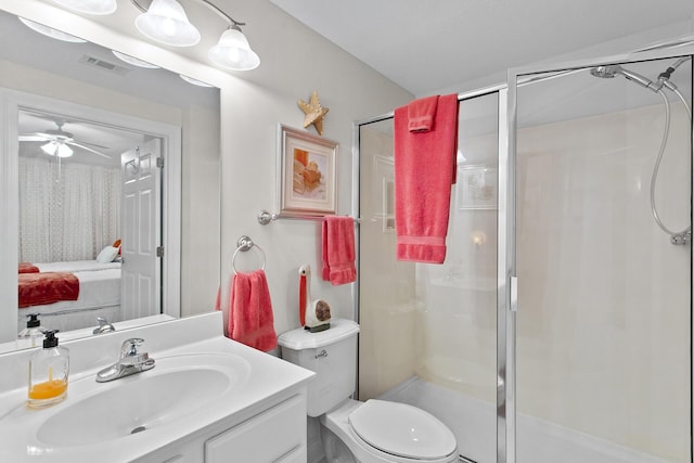 122 Seascape Dr Unit 701, Miramar Beach, FL 32550 - bathroom featuring visible vents, ceiling fan, a shower stall, and vanity