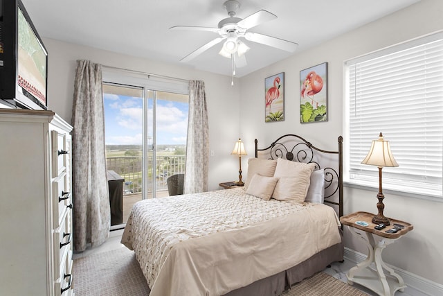 122 Seascape Dr Unit 701, Miramar Beach, FL 32550 - bedroom with access to exterior, baseboards, and a ceiling fan