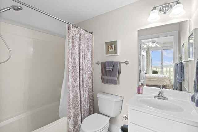 122 Seascape Dr Unit 701, Miramar Beach, FL 32550 - ensuite bathroom featuring shower / tub combo, vanity, ensuite bathroom, a ceiling fan, and toilet