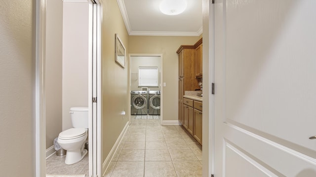 554 Magnolia Lake Dr, Defuniak Springs, FL 32433 - bathroom featuring washer and dryer, crown molding, tile patterned flooring, toilet, and vanity