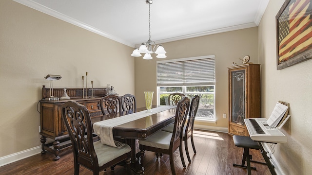 554 Magnolia Lake Dr, Defuniak Springs, FL 32433 - dining room featuring a chandelier, ornamental molding, baseboards, and dark wood-style flooring