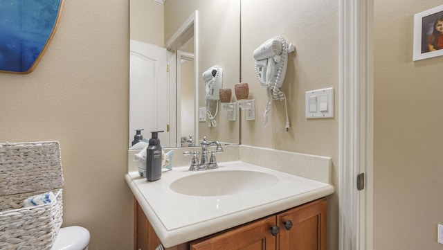 554 Magnolia Lake Dr, Defuniak Springs, FL 32433 - bathroom featuring vanity and toilet