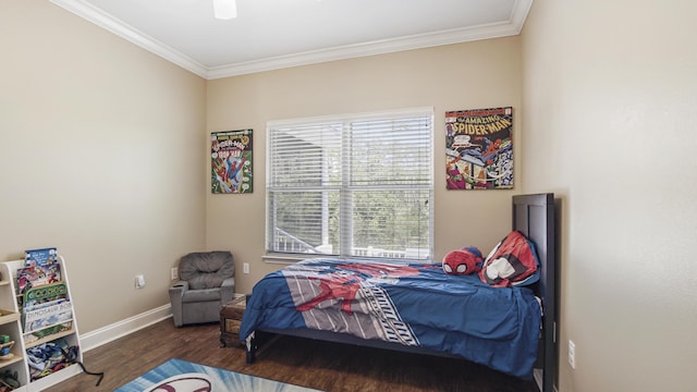 554 Magnolia Lake Dr, Defuniak Springs, FL 32433 - bedroom featuring crown molding, wood finished floors, and baseboards