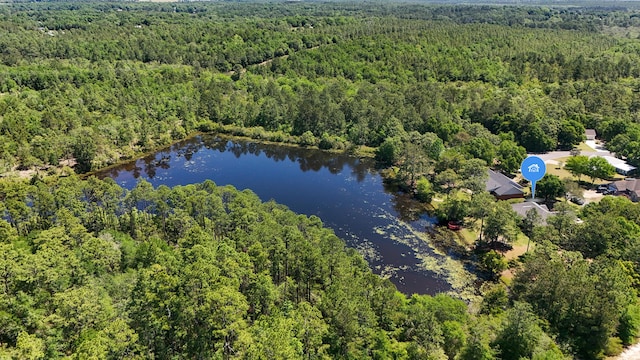 554 Magnolia Lake Dr, Defuniak Springs, FL 32433 - drone / aerial view of a heavily wooded area and a large body of water